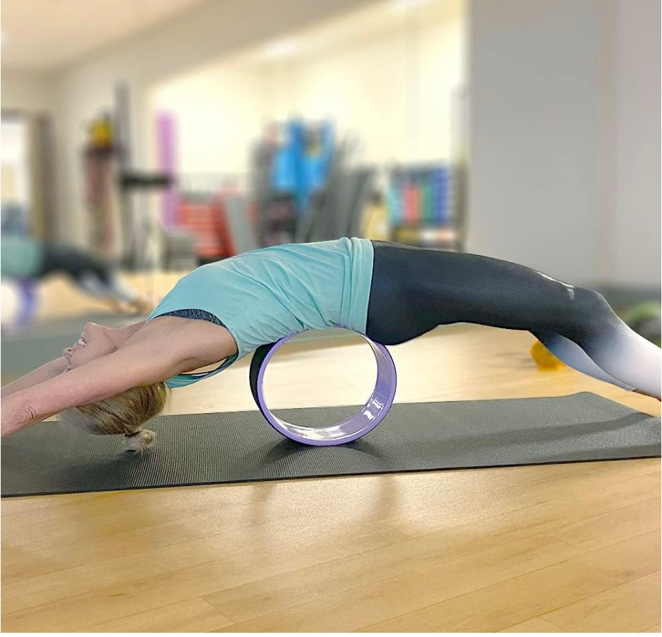 yoga wheel back stretch view by shayoda fitness 